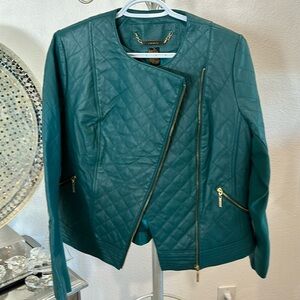 Stunning teal  00% leather Moto jacket in medium size brand is iman